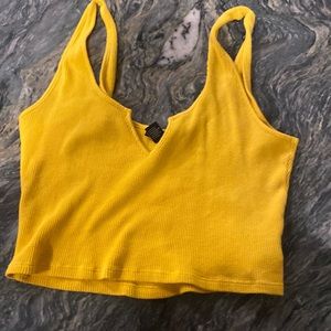 yellow crop top